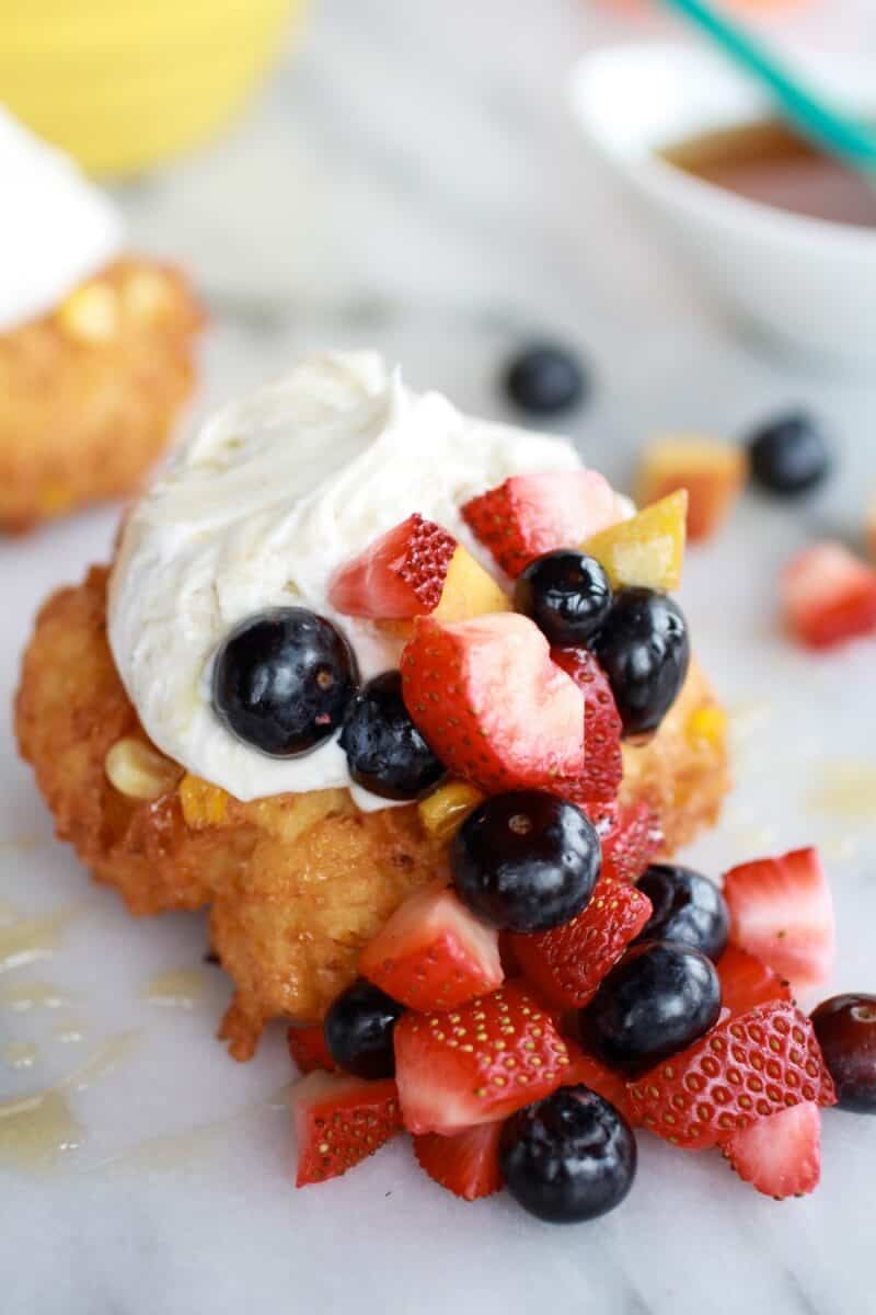 Corn Fritters with Coconut Whipped Cream and Sweet Honey Bourbon Syrup | https://dev.halfbakedharvest.com/