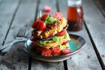 Avocado and Gouda BLT Corn Fritter Stacks with Chipotle Bourbon Dressing