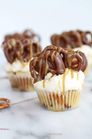 Chocolate Covered Pretzel Peanut Butter Cupcakes with Butterscotch Frosting