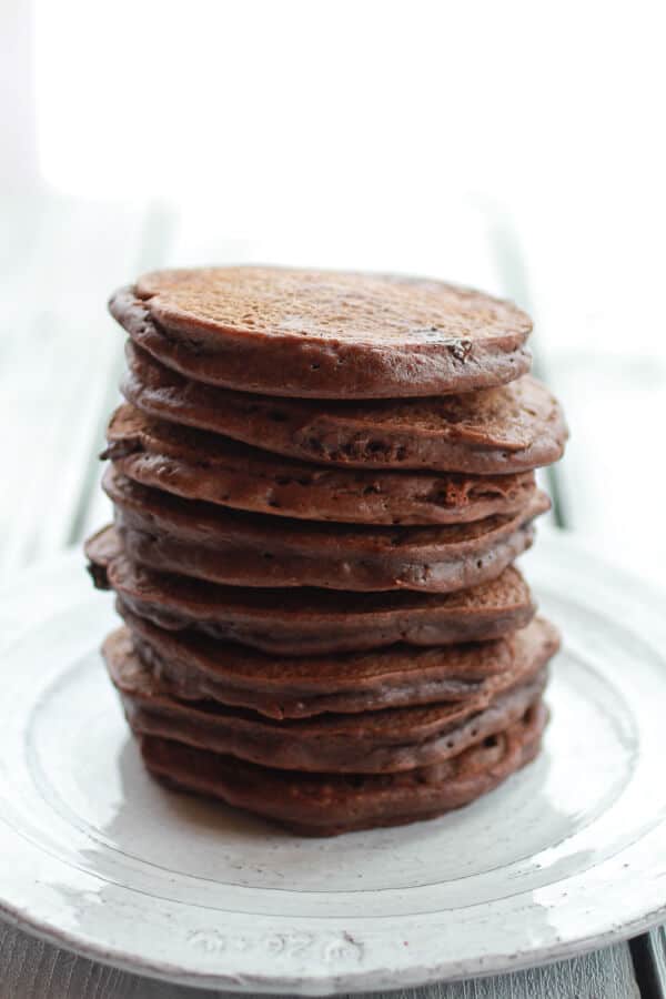 Chocolate Lovers Pumpkin Fudge Brownie Pancakes with Chocolate Kahlua Sauce | halfbakedharvest.com 