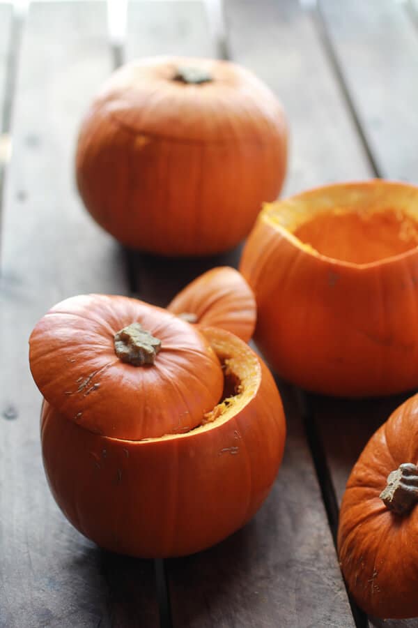 Roasted Garlic Sage Pesto Pumpkin Soup with Spicy Fried Pumpkin Seeds | halfbakedharvest.com