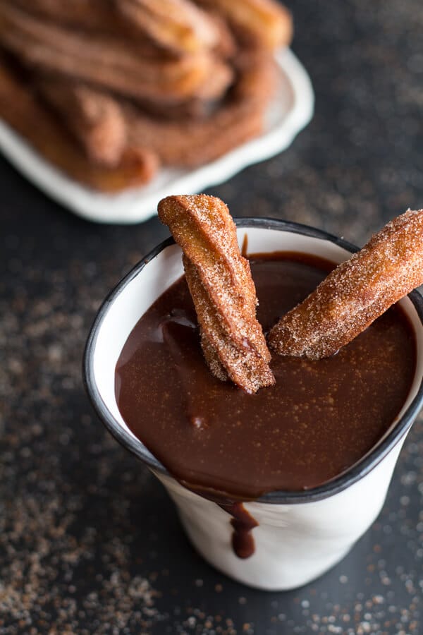 Mexican Beer Spiked Churros with Chocolate Dulce De Leche | halfbakedharvest.com