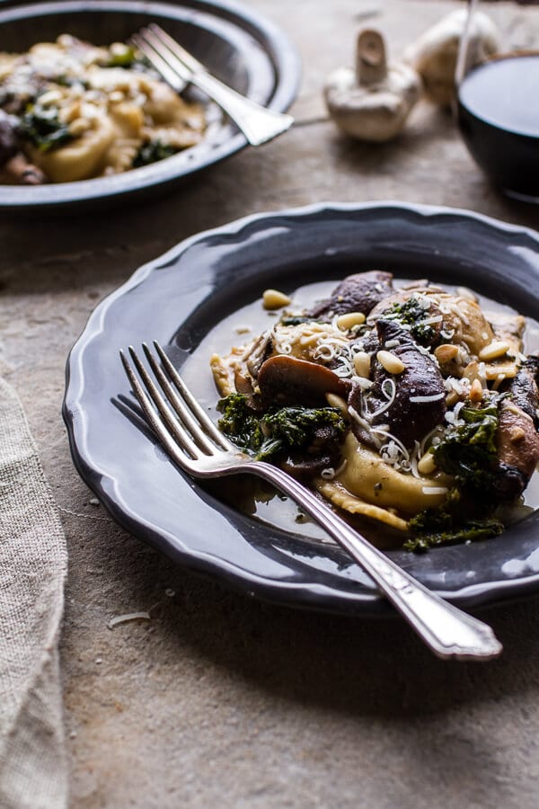Taleggio Ravioli with Garlicy Butter Kale and Wild Mushroom Sauce + Toasted Pine Nuts | halfbakedharvest.com @hbharvest