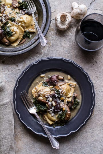 Taleggio Ravioli with Garlicy Butter Kale and Mushroom Sauce + Toasted Pine Nuts.