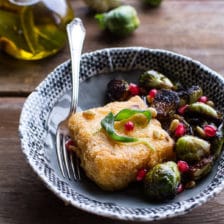 Cheesy Fried Polenta w/Pan Roasted Balsamic Brussels Sprouts + Roasted Garlic Sage Oil.