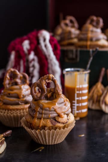 Death By Butterbeer Cupcakes w/Treacle Butter Frosting + Chocolate Covered Pretzels.