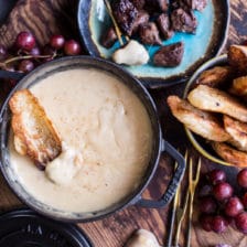 Smoky 3 Cheese Fondue with Toasted Garlic Buttered Croissants.