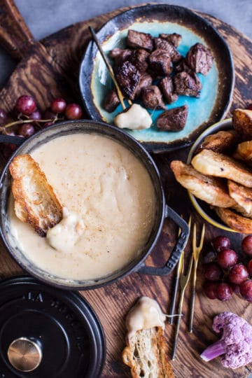 Smoky 3 Cheese Fondue with Toasted Garlic Buttered Croissants.