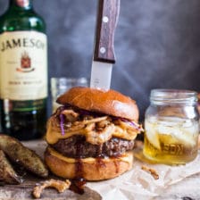 Jameson Whiskey Blue Cheese Burger with Guinness Cheese Sauce + Crispy Onions.