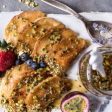 Lemon Ricotta Stuffed Syrian Pancakes with Lavender Passionfruit Syrup.
