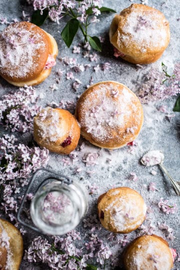 Strawberry Jelly and Vanilla Cream Brioche Doughnuts with Lilac Sugar.