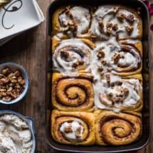Sweet Potato Pie Cinnamon Rolls with Butter Whipped Meringue Frosting.