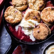 Strawberry Rhubarb Cobbler with Honey Butter Biscuits.