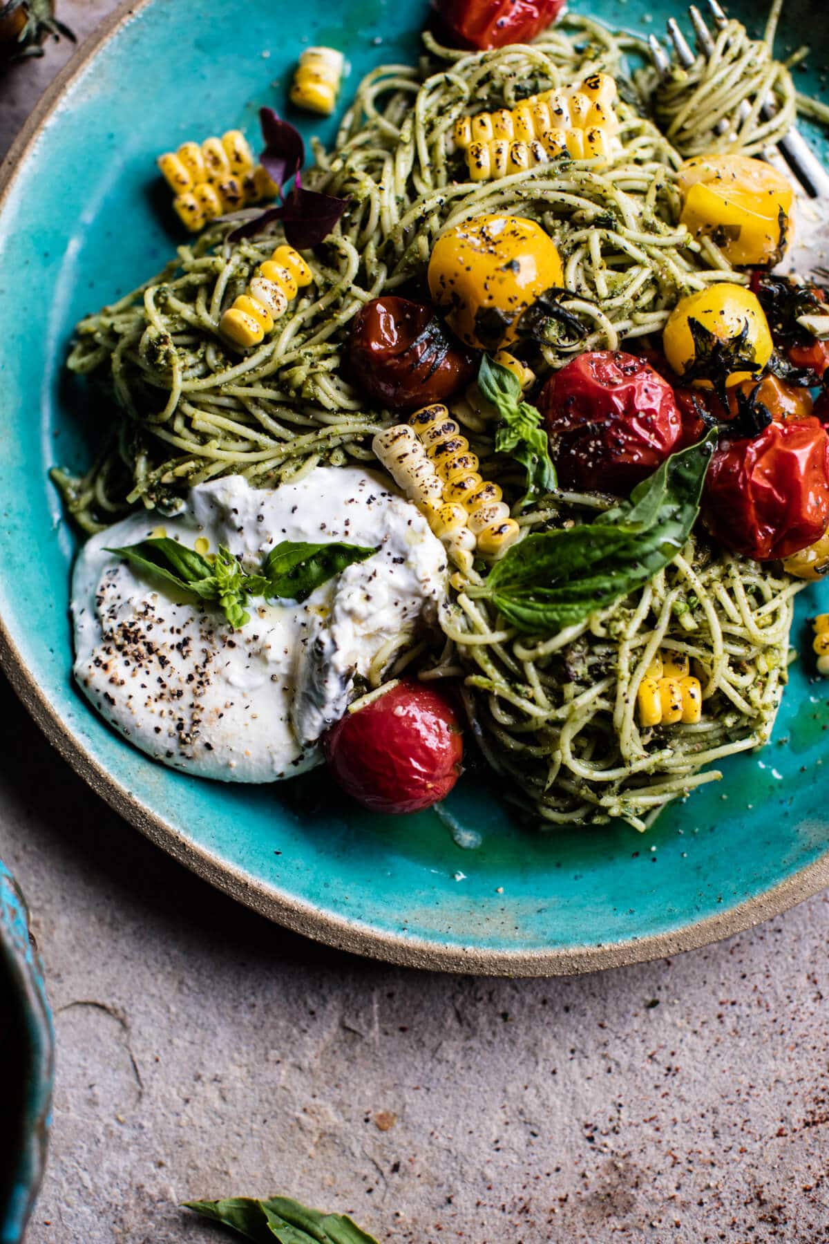 Charred Tomato and Corn Pesto Pasta | halfbakedharvest.com @hbharvest