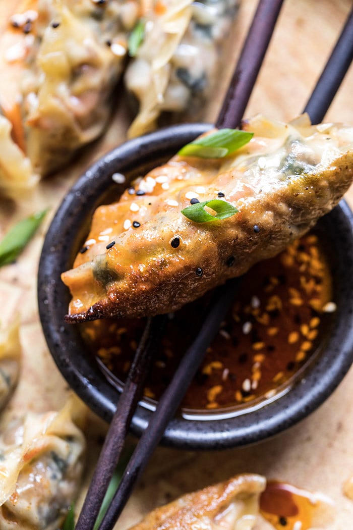 Homemade Vegetable Potstickers with Toasted Sesame Honey Soy Sauce | halfbakedharvest.com #vegan #recipes #healthy #homemade