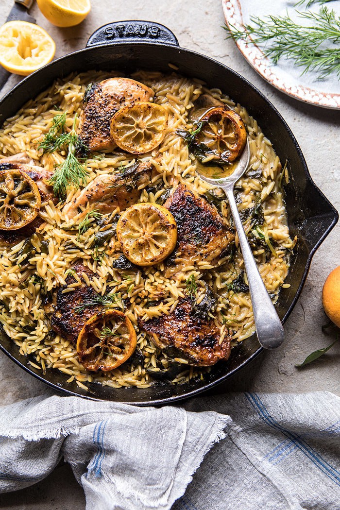 overhead photo of One Skillet Lemon Butter Chicken and Orzo in skillet with spoon