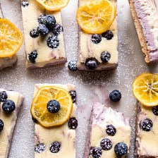 Blueberry Lemon Cheesecake Bars with Candied Lemon.