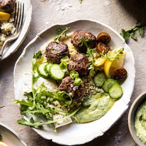 Greek Lamb Meatballs with Avocado Goddess Sauce | halfbakedharvest.com #lamb #easy #meatballs