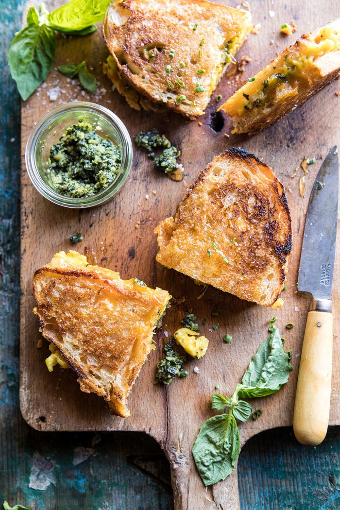 overhead photo of Breakfast Grilled Cheese with Soft Scrambled Eggs and Pesto