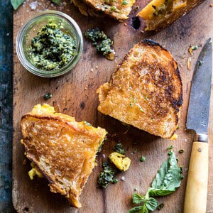 Breakfast Grilled Cheese with Soft Scrambled Eggs and Pesto.