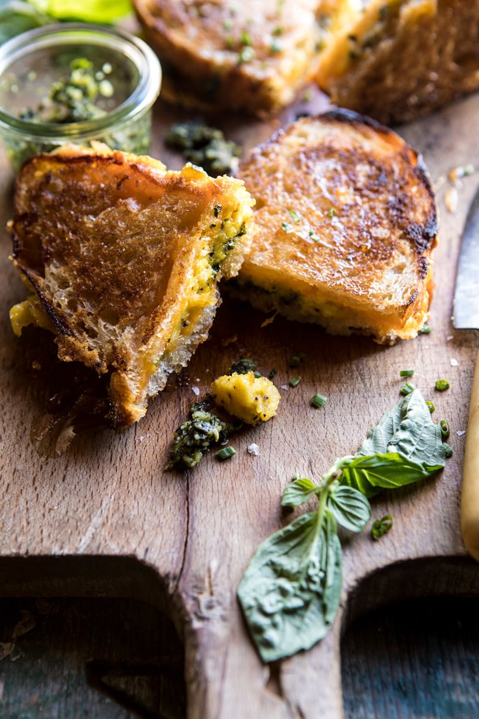 front on photo of Breakfast Grilled Cheese with Soft Scrambled Eggs and Pesto