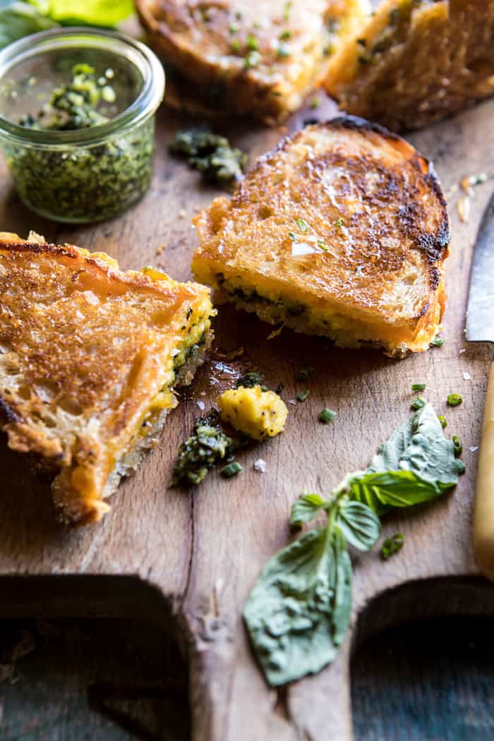 front on photo of Breakfast Grilled Cheese with Soft Scrambled Eggs and Pesto with basil
