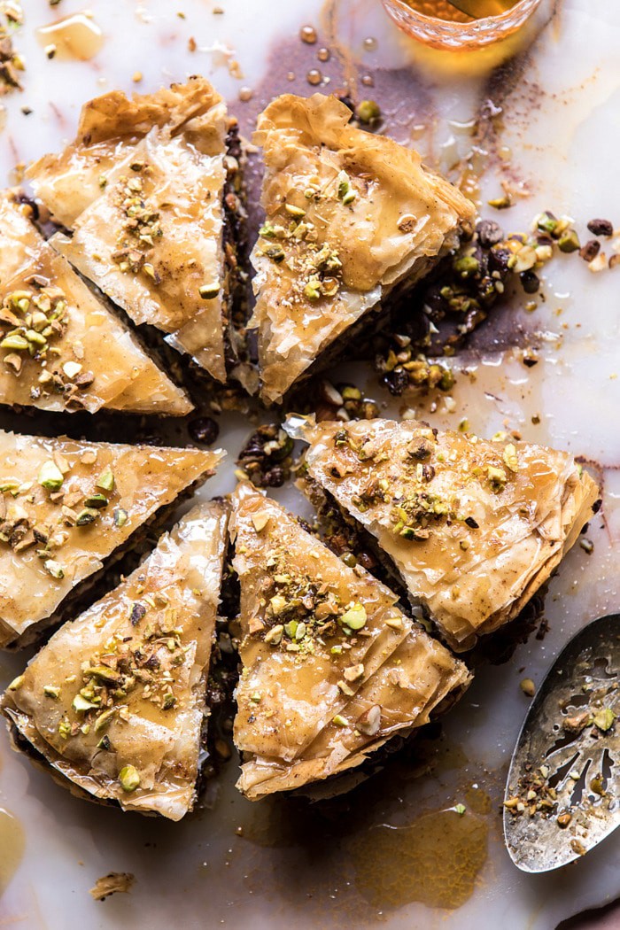 overhead photo of Easy Pistachio Chocolate Baklava with piece missing