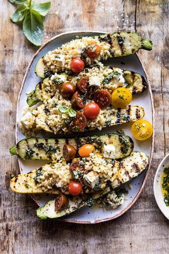 Grilled Pesto Zucchini Stuffed with Tomatoes and Orzo.