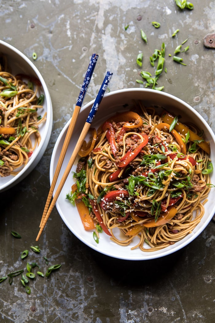 overhead photo of Weeknight 20 Minute Spicy Udon Noodles with chop sticks