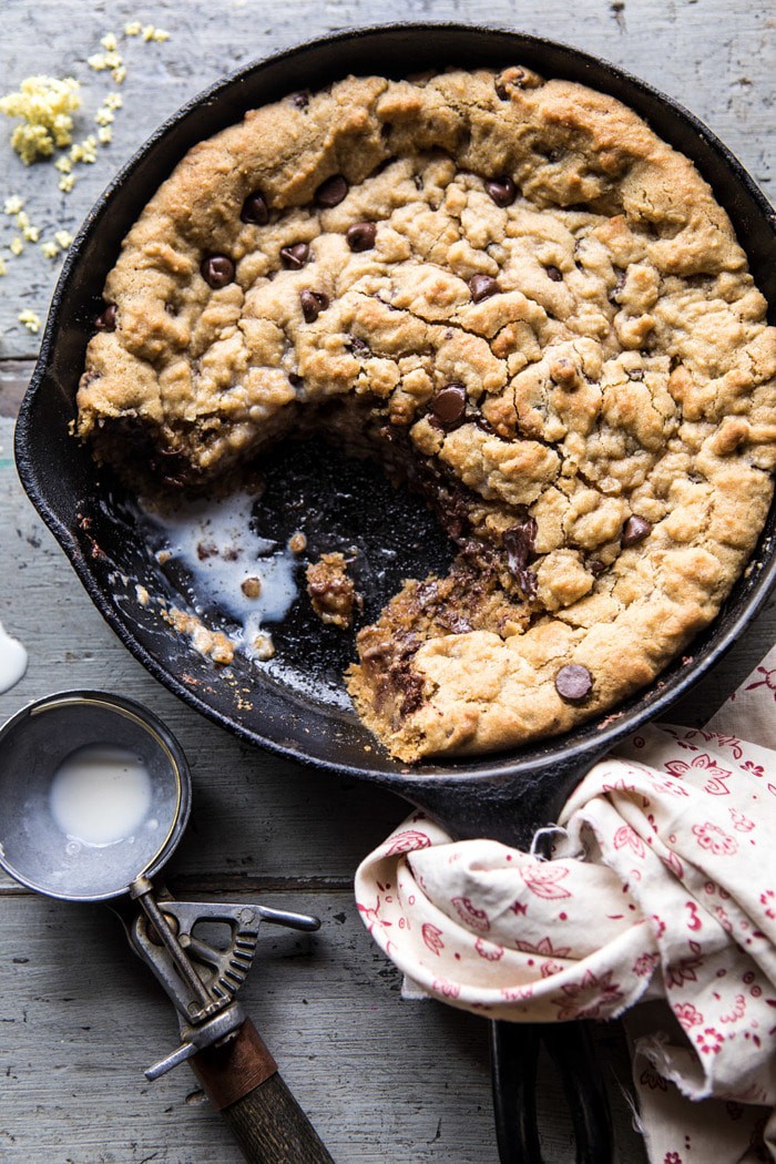 overhead photo of half eaten Whole Wheat Chocolate Chip Skillet Cookie