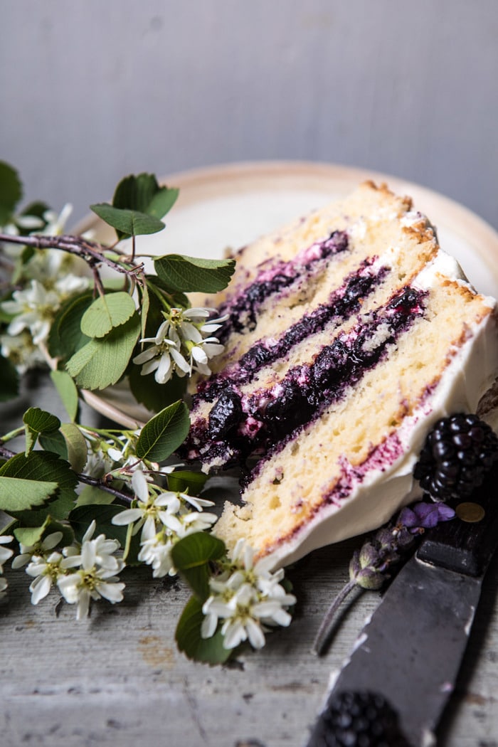 close up photo of Blackberry Lavender Naked Cake slice