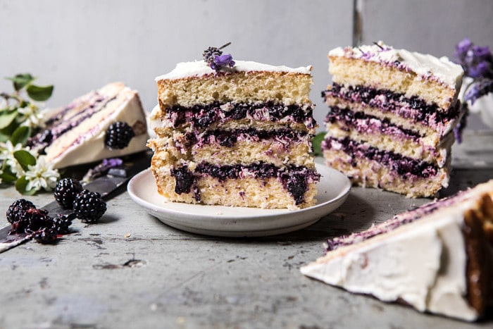 horizontal photo of Blackberry Lavender Naked Cake with White Chocolate Buttercream