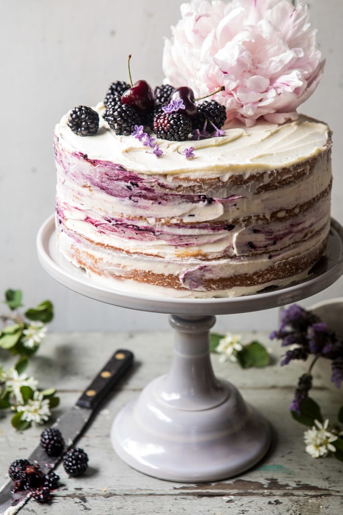 close up side angled photo of Blackberry Lavender Naked Cake with White Chocolate Buttercream 