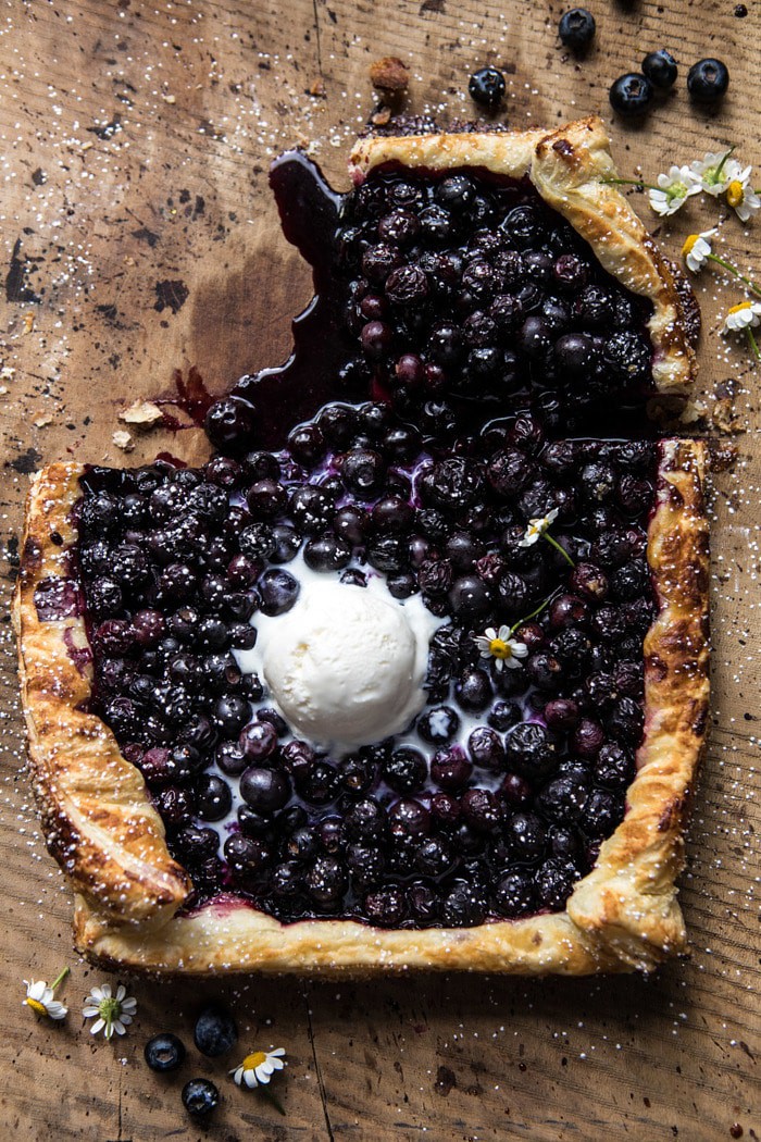 overhead photo of Blueberry Chamomile Galette with piece missing