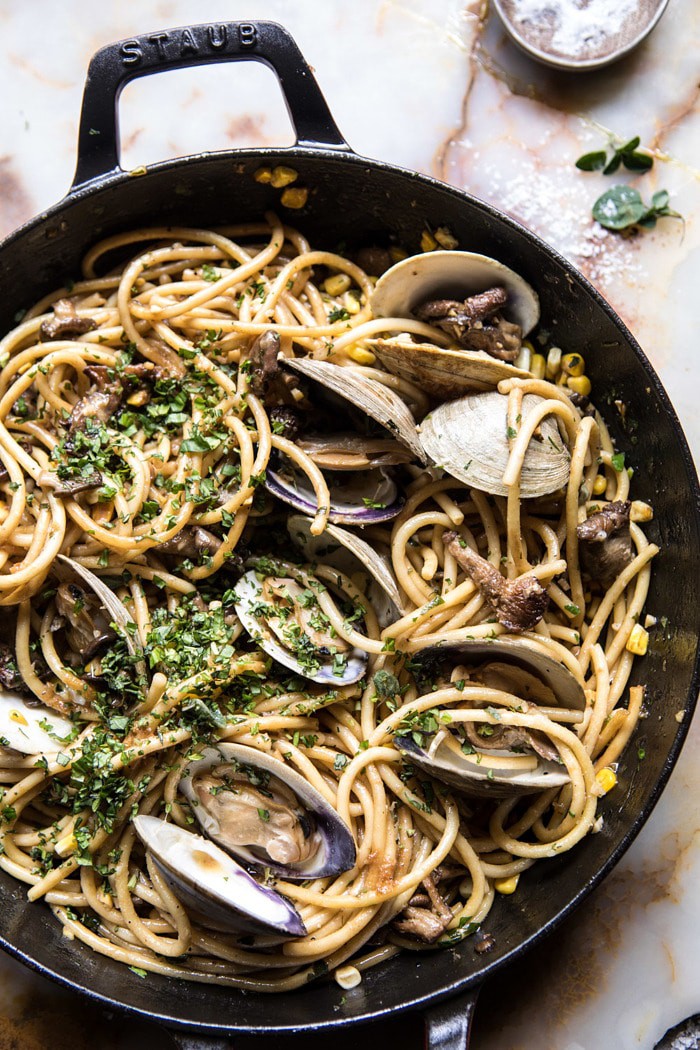 overhead photo of Buttery Mushroom and Clam Pasta in skillet