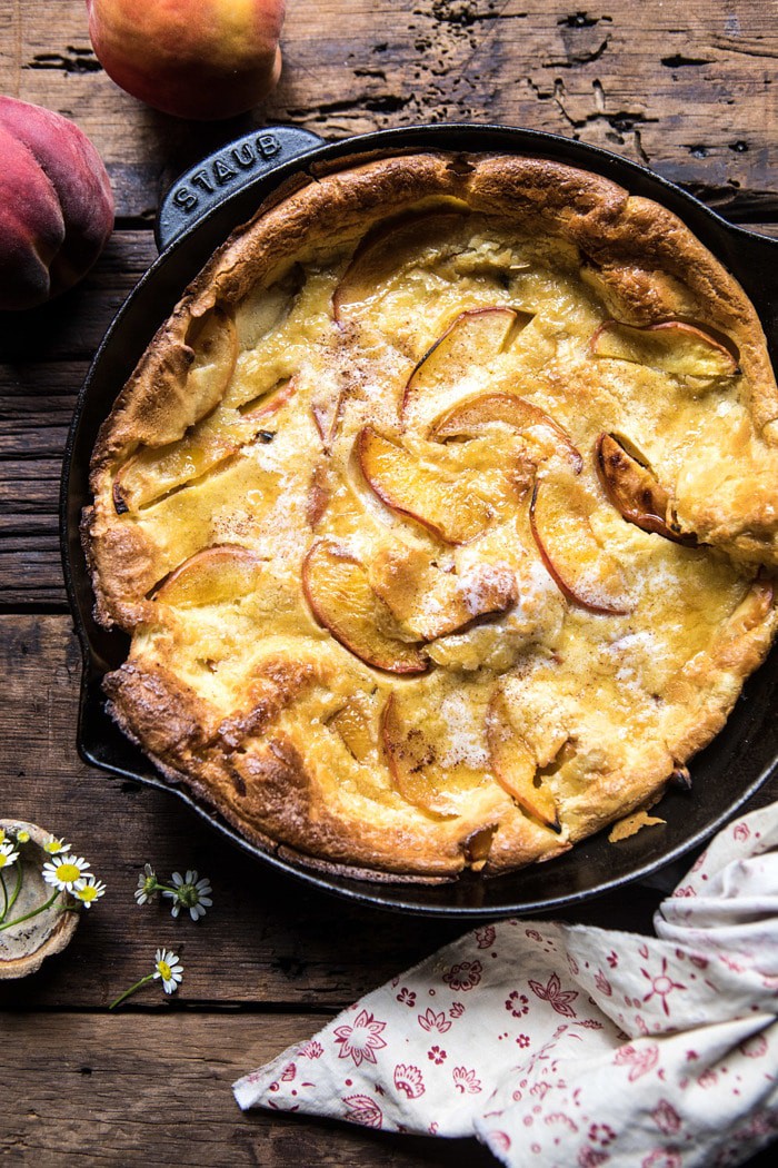 overhead photo of Browned Butter Cinnamon Peach Dutch Baby 