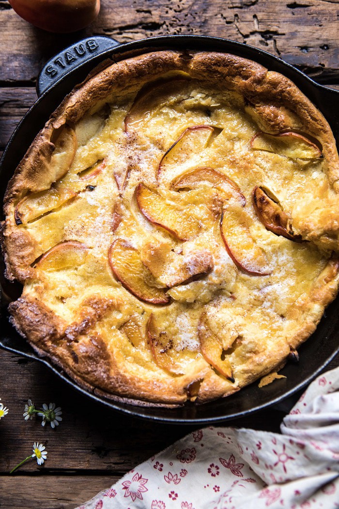 overhead close up photo of Browned Butter Cinnamon Peach Dutch Baby