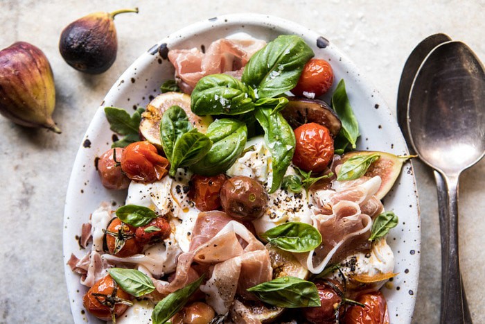 horizontal photo of Fresh Fig, Prosciutto, and Arugula Salad with Cherry Tomato Vinaigrette