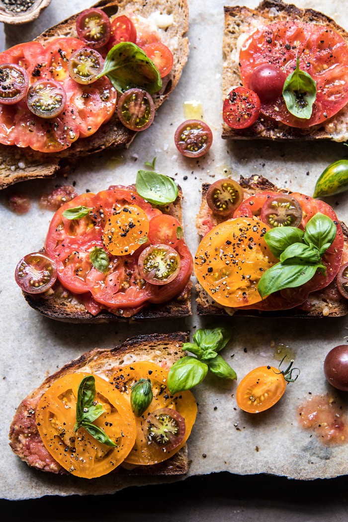 Heirloom Tomato, Basil, and Manchego Toast | halfbakedharvest.com #tomatoes #basil #easyrecipes #summerrecipes