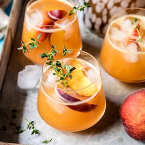 Sweet Bourbon Peach Lemonade | halfbakedharvest.com #peaches #bourbon #lemonade