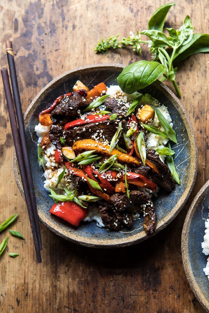overhead photo of 30 Minute Korean Beef and Peppers with Sesame Rice and chopsticks on side of bowl