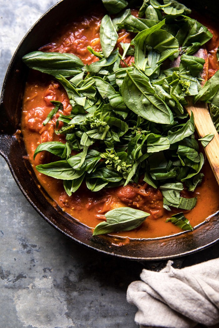 Basil Pomodoro sauce in skillet with basil on top