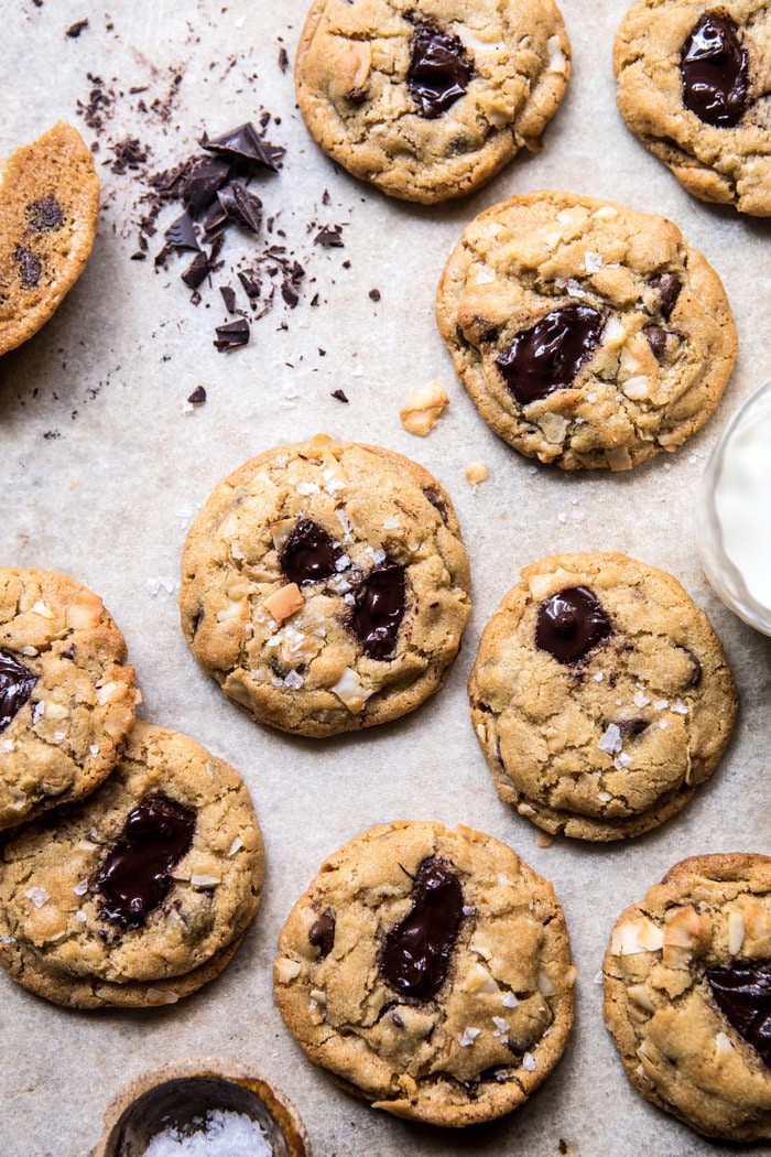 overhead photo of Browned Butter Coconut Chocolate Chip Cookies with milk in photo 