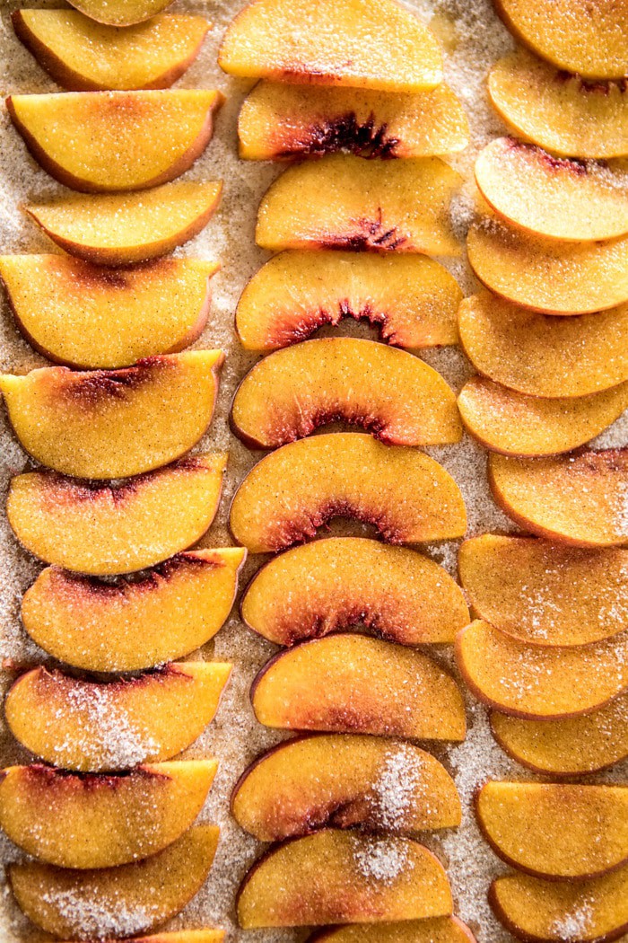 sliced peaches on brioche dough 
