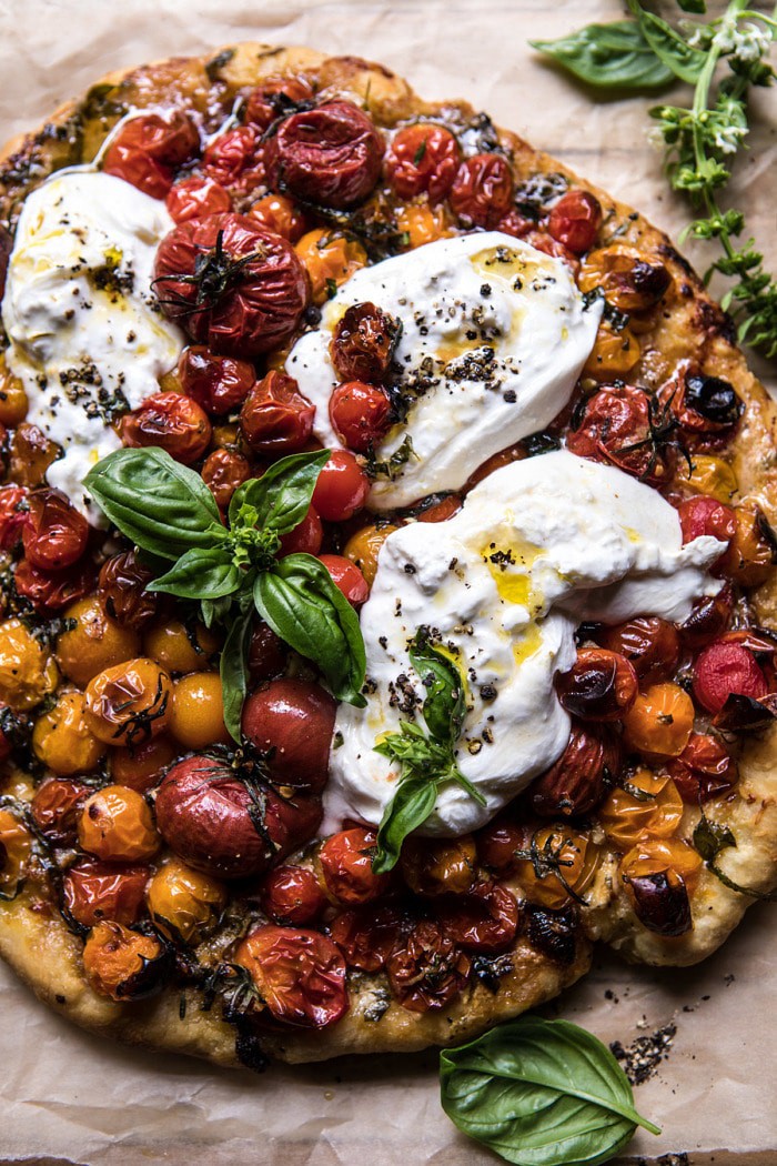 close up photo of Garlic and Herb Roasted Cherry Tomato Pizza with Caramelized Onions