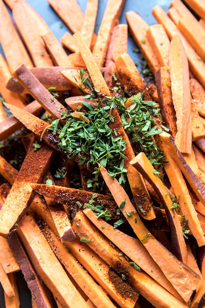 overhead photo of sweet potatoes fries before baking