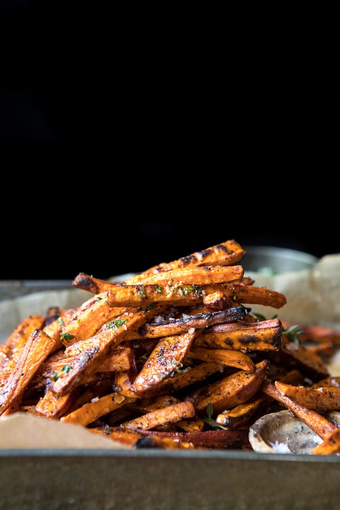 side angle photo of Herb Butter Baked Sweet Potato Fries