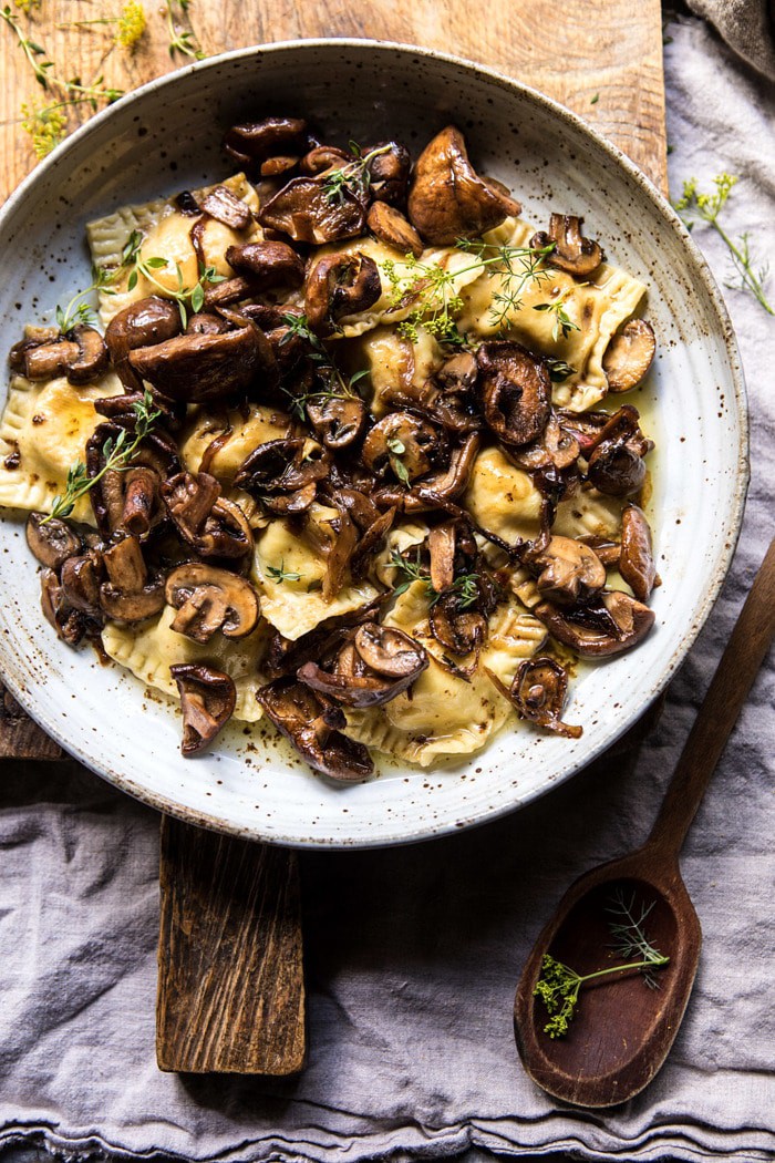 Herby Buttered Balsamic Mushroom Ravioli in serving bowl 