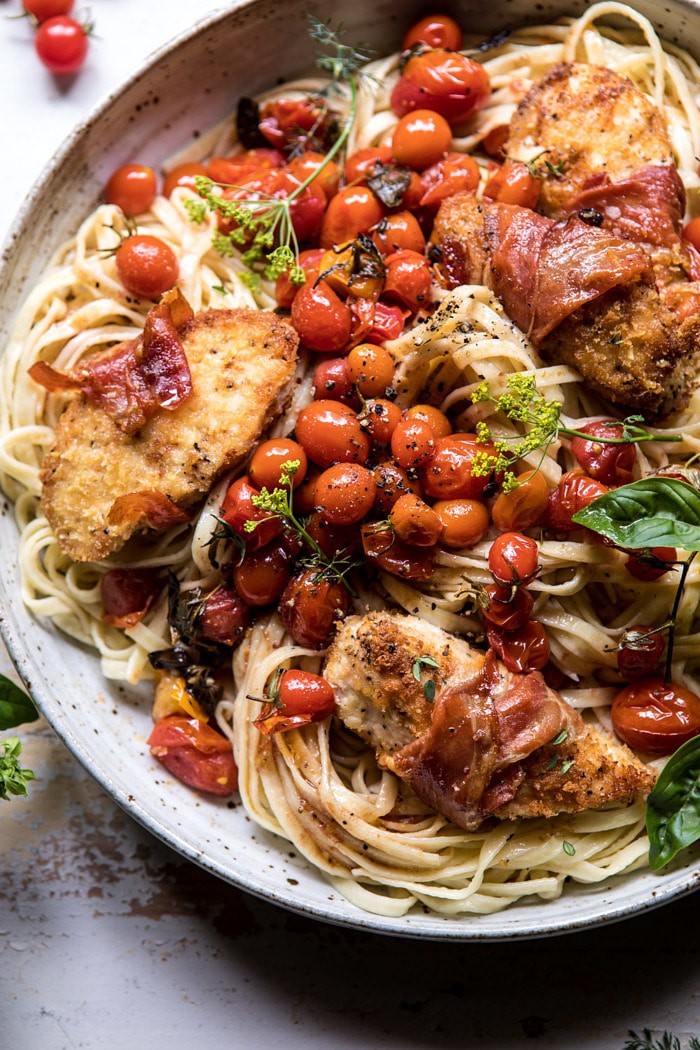 close up photo of Prosciutto Chicken Parmesan with Garlic Butter Tomato Pasta 