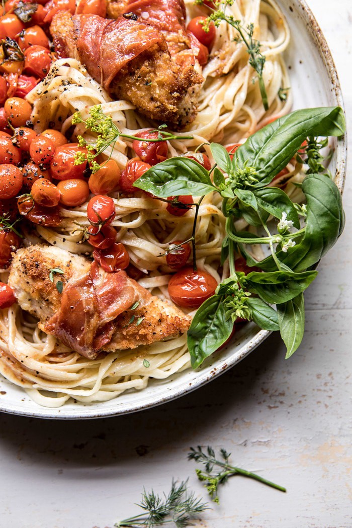 overhead close up photo of Prosciutto Chicken Parmesan with Garlic Butter Tomato Pasta